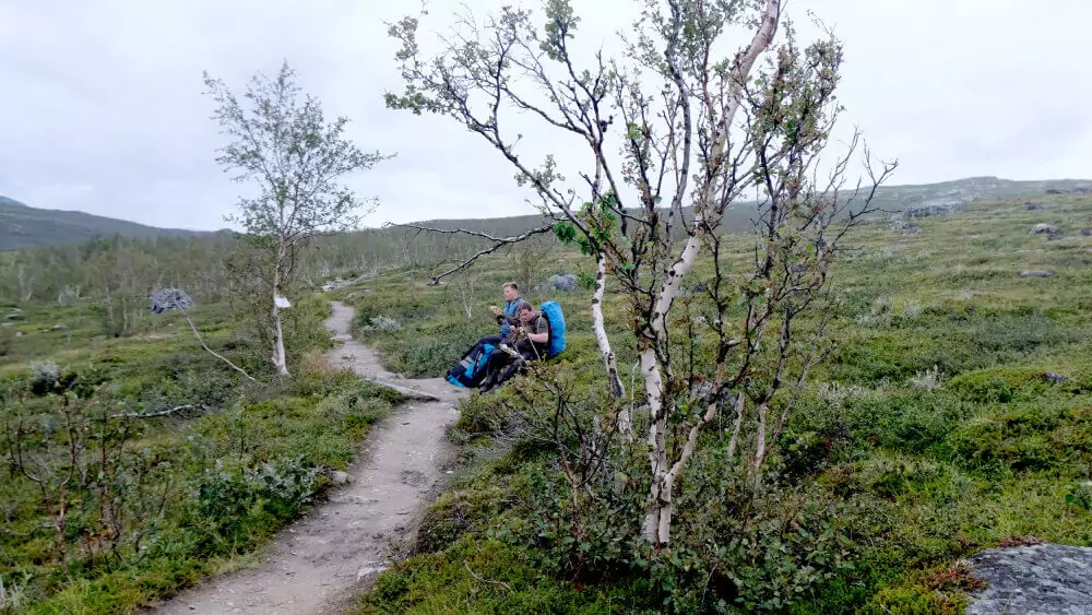 David and Jack take a rest on a rock